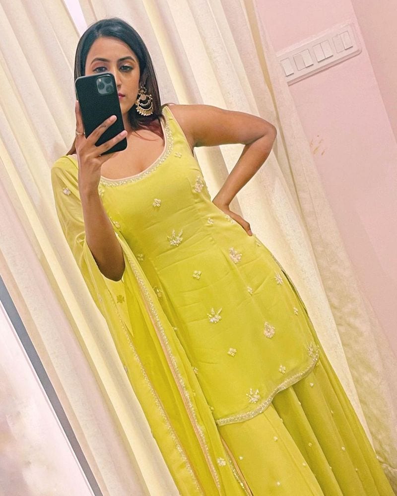 mega daughter niharika kondiela looks super stylish in yellow designer wear