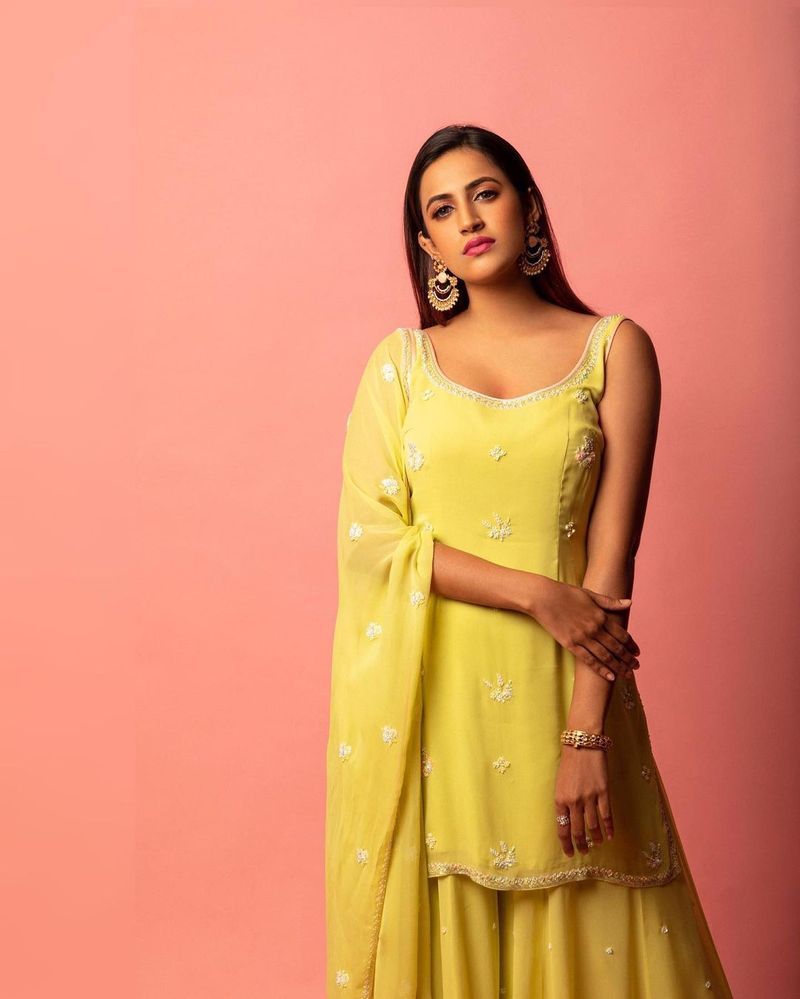 mega daughter niharika kondiela looks super stylish in yellow designer wear
