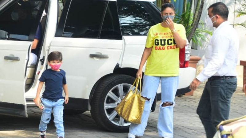 kareena kapoor spotted wearing loose pant and hidding without makeup face in mask