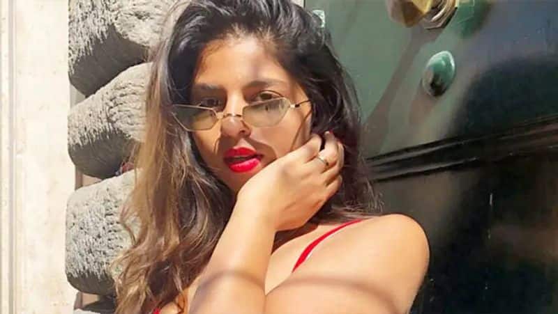 Suhana Khan posed on a couch in an Animal print Cami check out the pics bRD