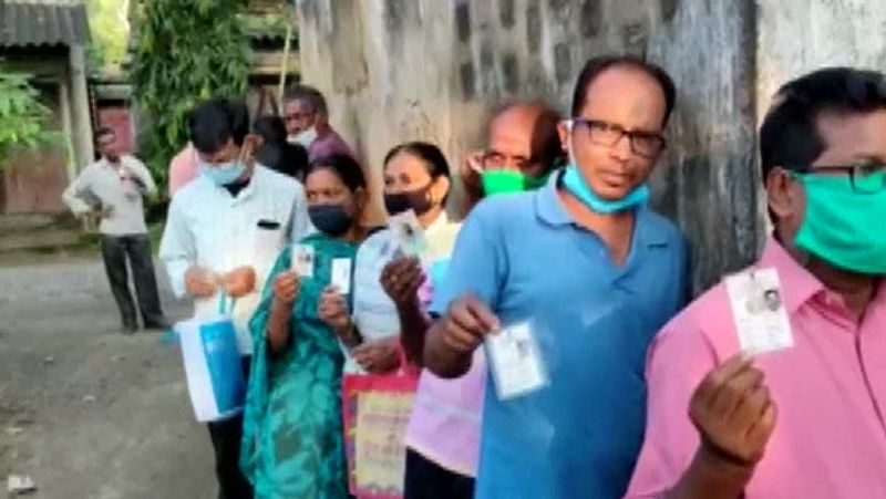 By elections in 14 states See pictures in voters in queues soldiers in readiness