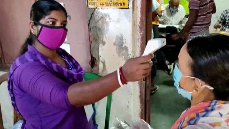 By elections in 14 states See pictures in voters in queues soldiers in readiness