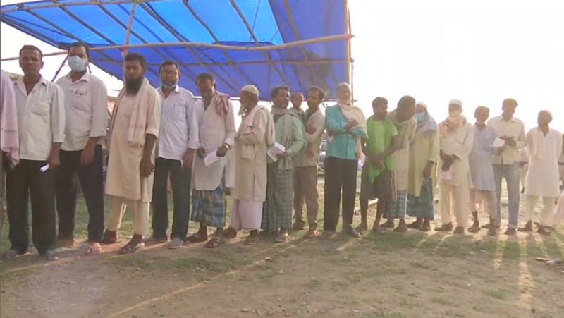 By elections in 14 states See pictures in voters in queues soldiers in readiness