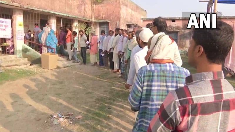 By elections in 14 states See pictures in voters in queues soldiers in readiness