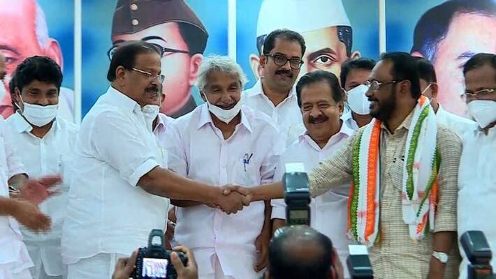 Cherian Philip receives congress membership from K Sudhakaran Cherian Philip receives congress membership from K Sudhakaran