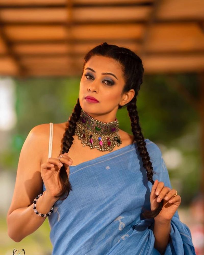 Actress Priyamani mesmerizing poses in Blue saree