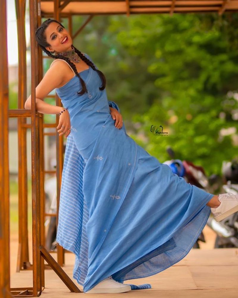 Actress Priyamani mesmerizing poses in Blue saree