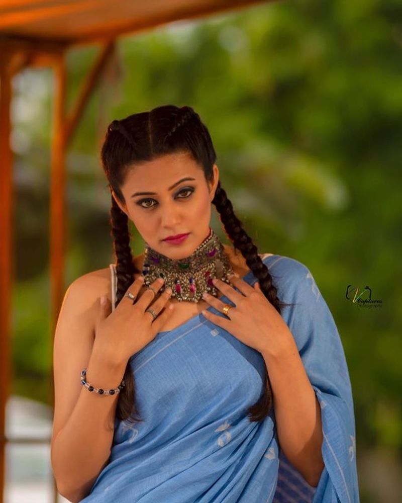 Actress Priyamani mesmerizing poses in Blue saree