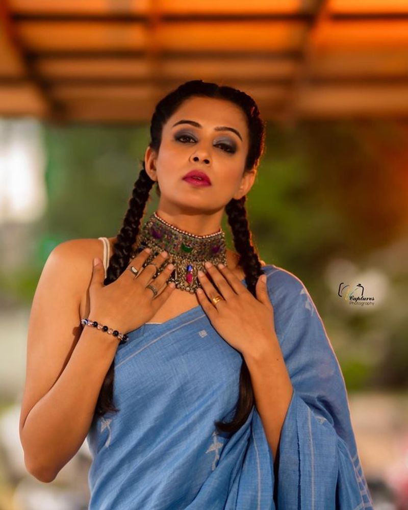Actress Priyamani mesmerizing poses in Blue saree