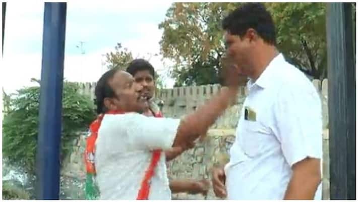 BJP leader slaps policeman on duty in Raichur BJP leader slaps policeman on duty in Raichur
