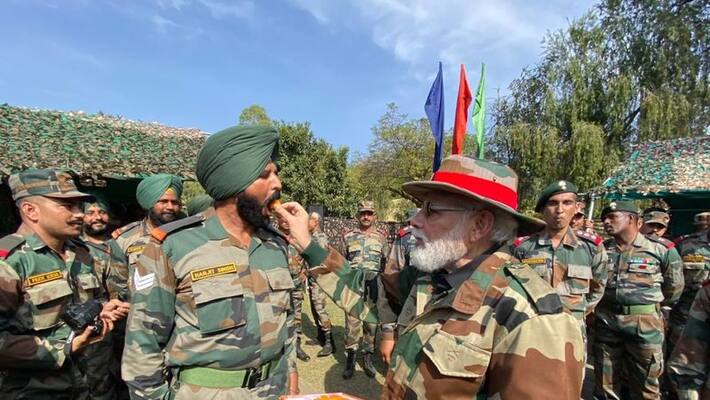 Modi celebrates Diwali with army personnel at the border .. What is the message to the enemies ..? Modi celebrates Diwali with army personnel at the border .. What is the message to the enemies ..?