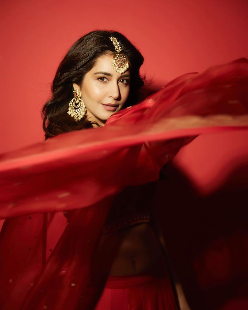 heroin raashi khanna diwali treat to fans shines in red choli lehanga