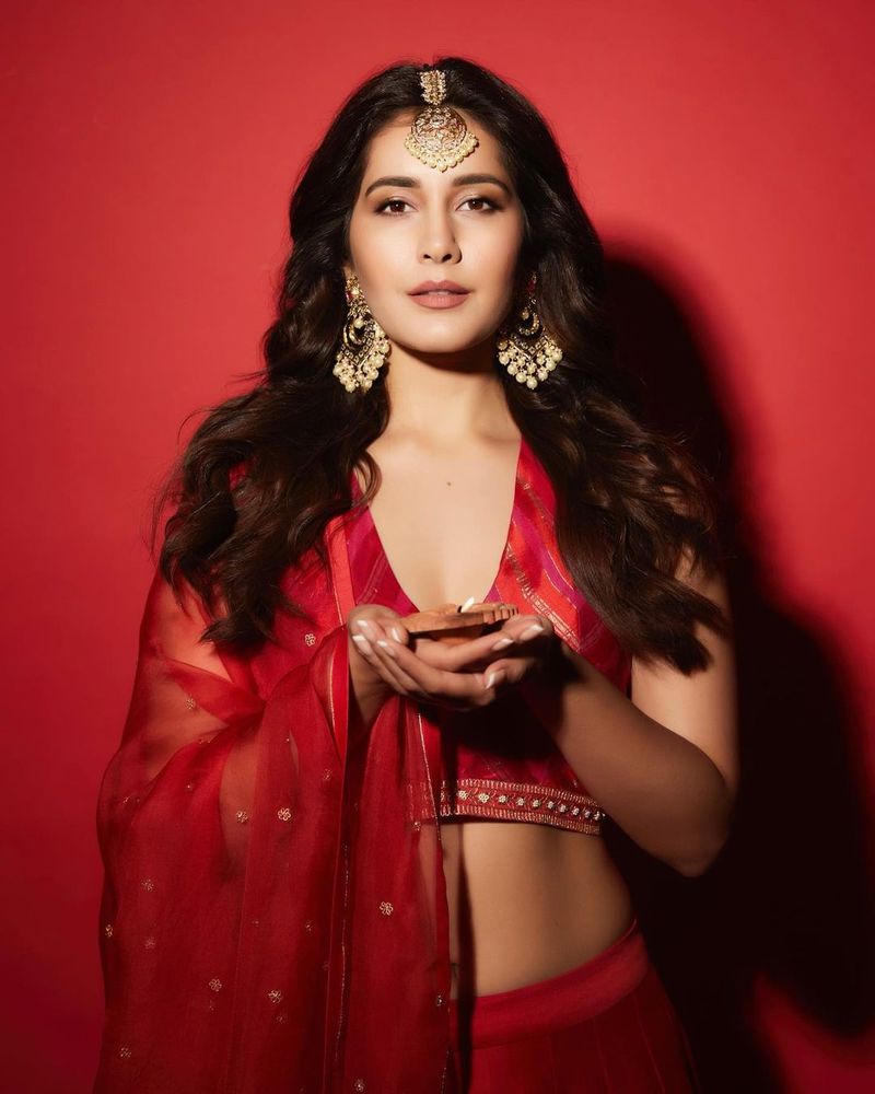 heroin raashi khanna diwali treat to fans shines in red choli lehanga