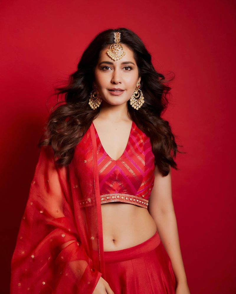 heroin raashi khanna diwali treat to fans shines in red choli lehanga