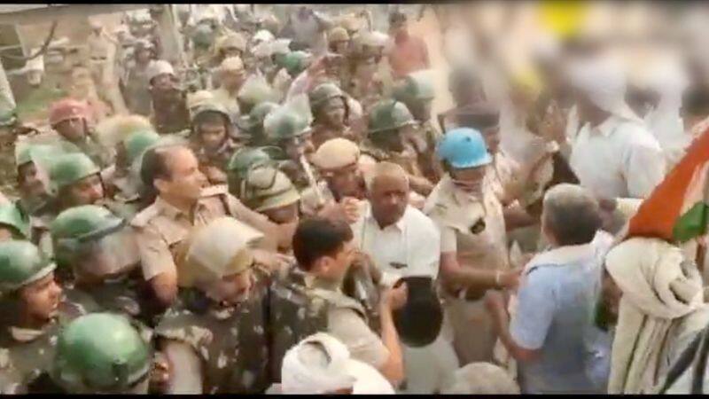 BJP MP s car attacked party leaders confined in temple as protests turn violent