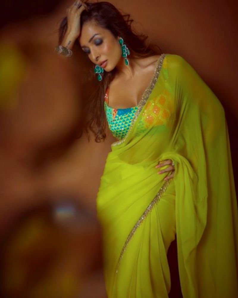 Malaika Arora Flaunts her style in Manish Malhotra designed lemon colors saree pallu is special dpl