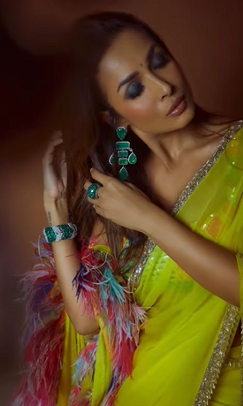 Malaika Arora Flaunts her style in Manish Malhotra designed lemon colors saree pallu is special dpl