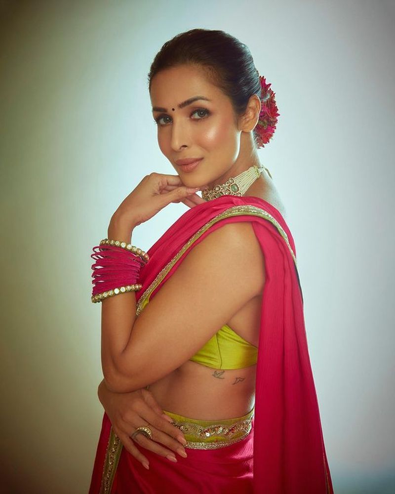 Malaika Arora red saree photos are eye feast