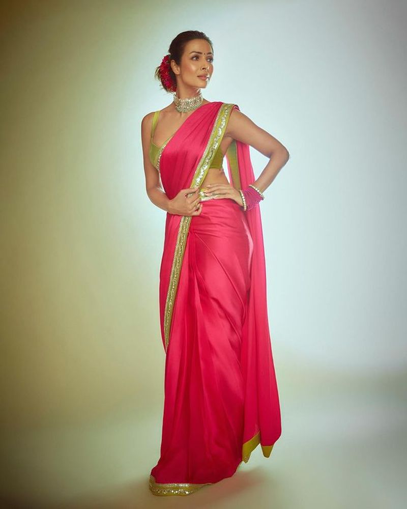 Malaika Arora red saree photos are eye feast