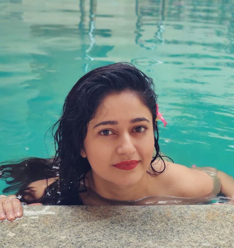 Alluring Actress poonam bajwa swimming pool bold and hot photos