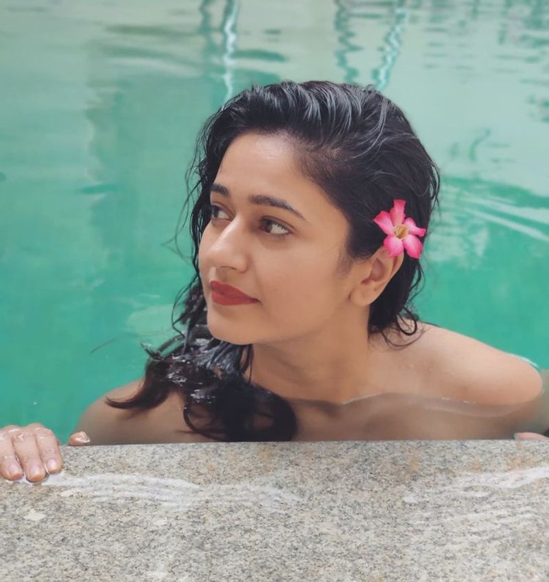 Alluring Actress poonam bajwa swimming pool bold and hot photos