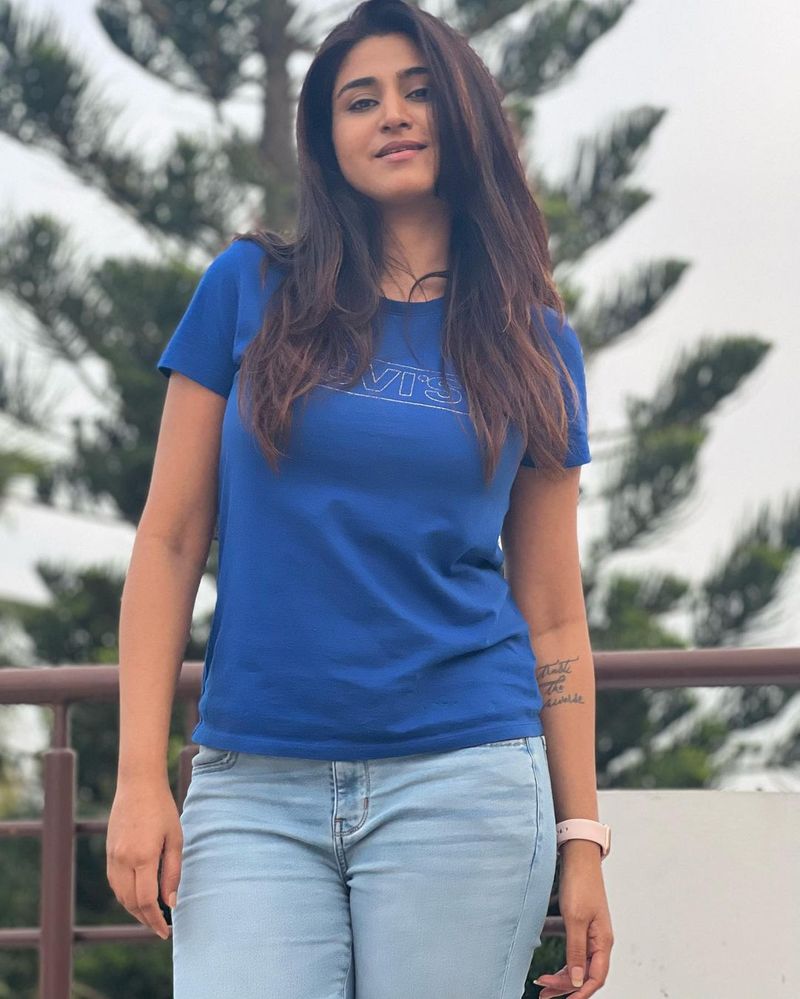 young anchor Varshini sounderajan ultra stylish look in tight jeans stuns everyone