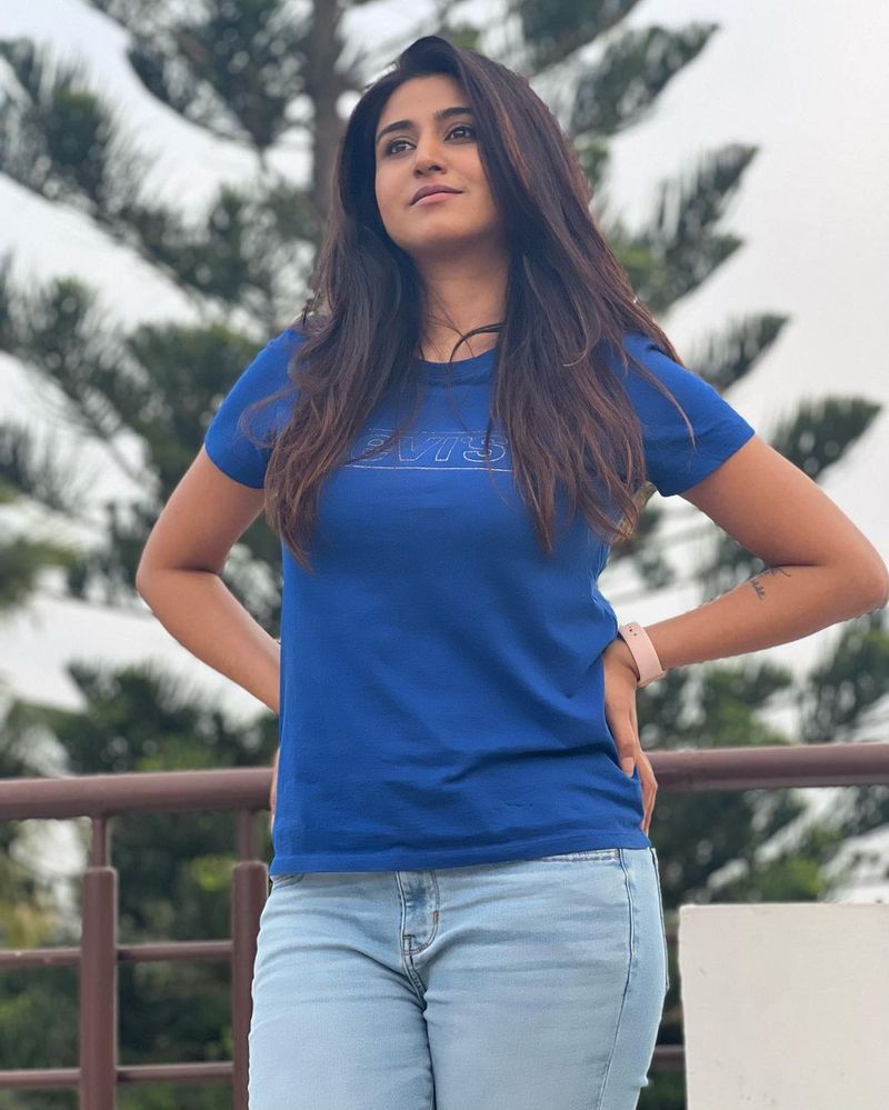 young anchor Varshini sounderajan ultra stylish look in tight jeans stuns everyone