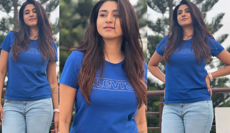 young anchor Varshini sounderajan ultra stylish look in tight jeans stuns everyone