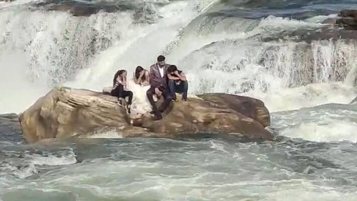 Rajasthan Chittorgarh couple pre wedding shoot Chulia Waterfalls trapped in flood due to water of dam UDT