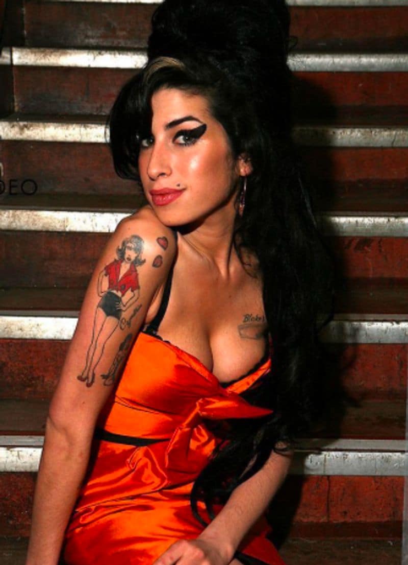 Dress worn by Amy Winehouse in her last concert sells for 1 80 crore rupees dpl