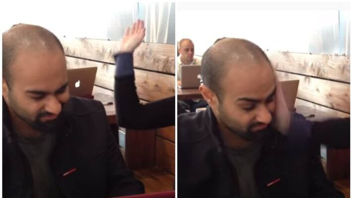 Young Blogger hires woman to slap him every time he is on Facebook Young Blogger hires woman to slap him every time he is on Facebook