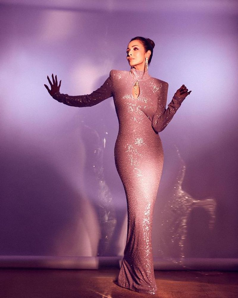 Malaika Arora skin tight purple dress photos shoot is stunning