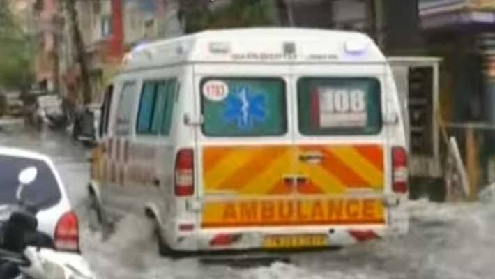 Ambulance team rescues woman with chest pain in 3 feet high rain water Ambulance team rescues woman with chest pain in 3 feet high rain water