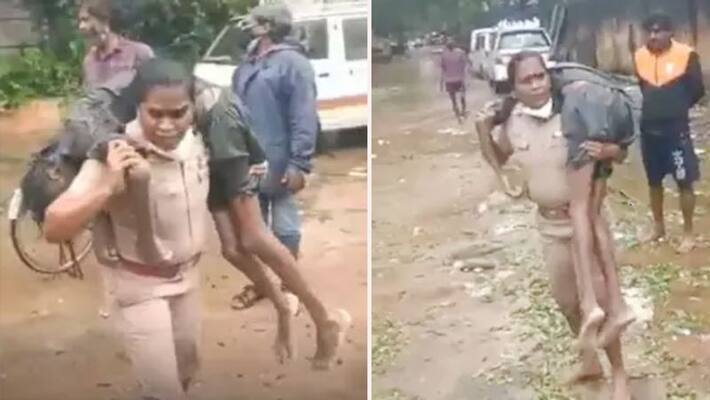 tamil nadu heavy rains chennai female police inspector rajeshwari saved young man life video viral tamil nadu heavy rains chennai female police inspector rajeshwari saved young man life video viral