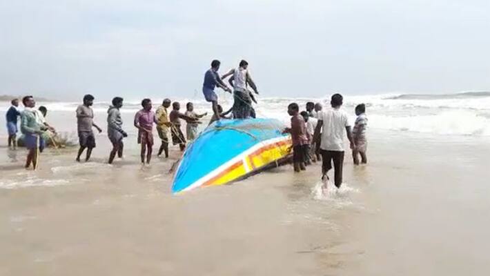 fishermen trapped at the sea in east godavari district fishermen trapped at the sea in east godavari district