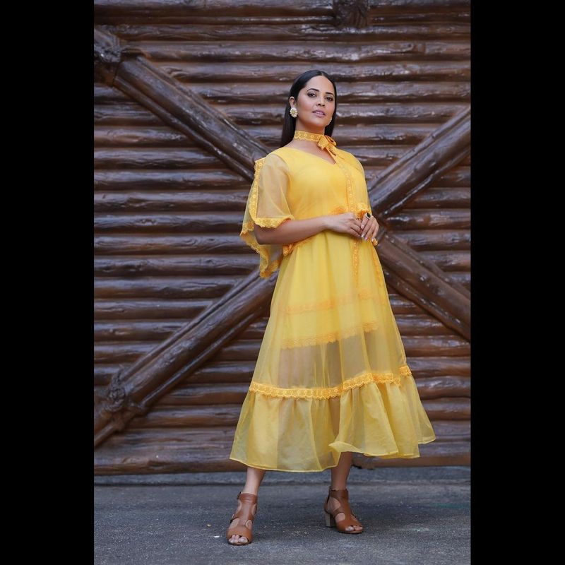 anchor ansuya latest photo shoot blows your mind for sure she shines in yellow frack