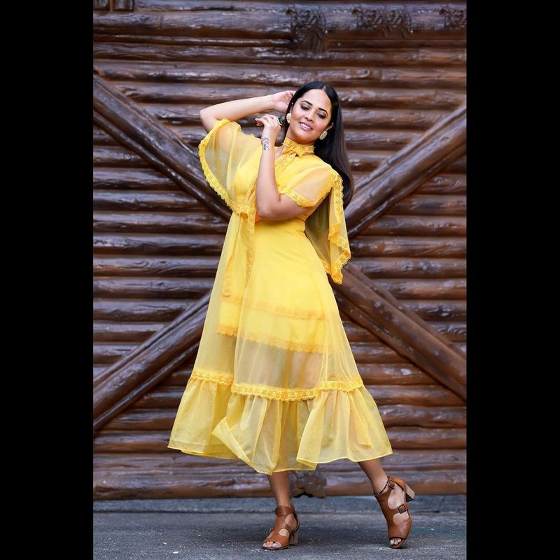 anchor ansuya latest photo shoot blows your mind for sure she shines in yellow frack