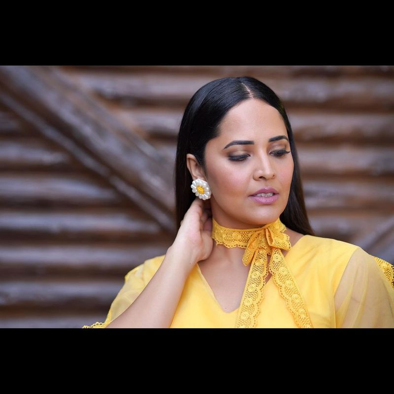 anchor ansuya latest photo shoot blows your mind for sure she shines in yellow frack