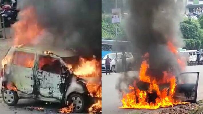 car catches fire near kozhikode medical college video car catches fire near kozhikode medical college video