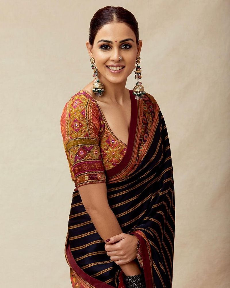 Actress genelia wear low neck blouse and black saree latest photo