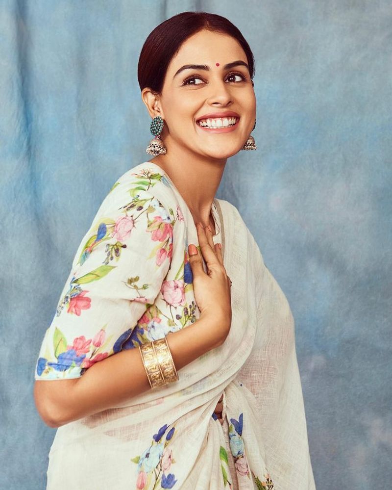 Actress genelia wear low neck blouse and black saree latest photo