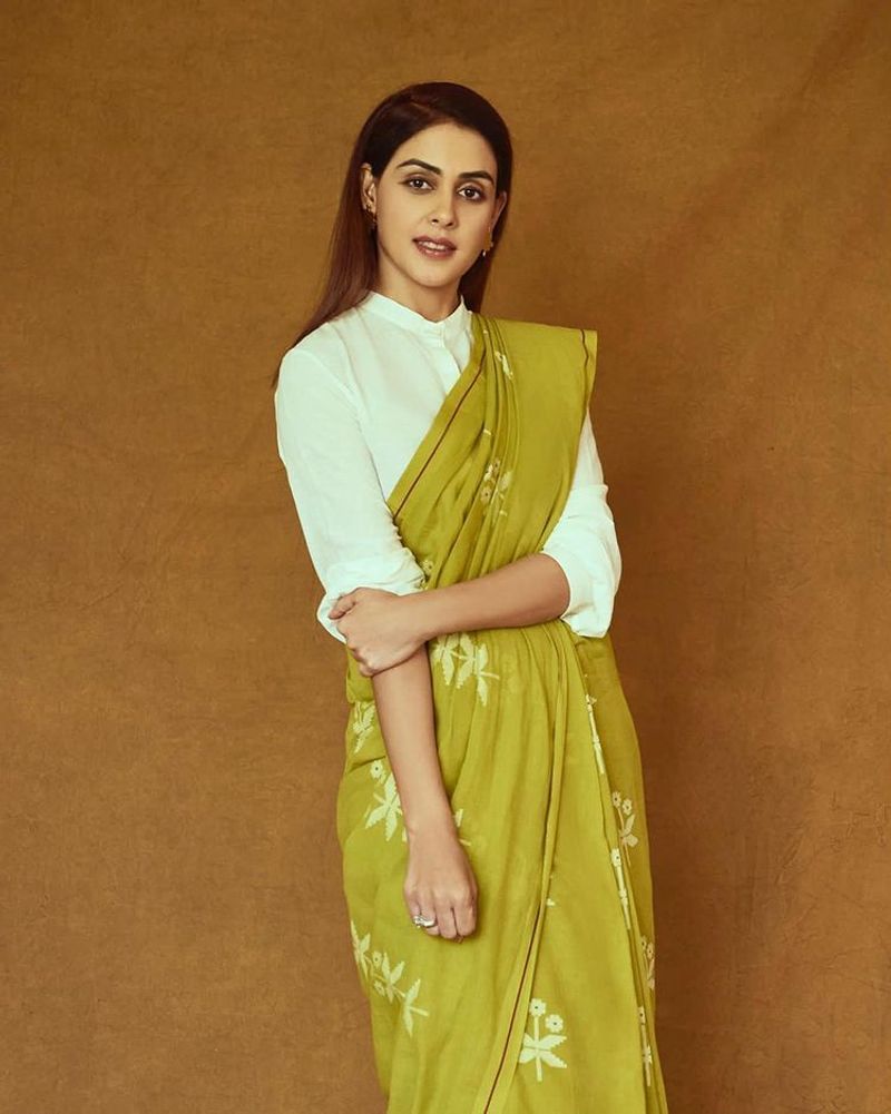 Actress genelia wear low neck blouse and black saree latest photo
