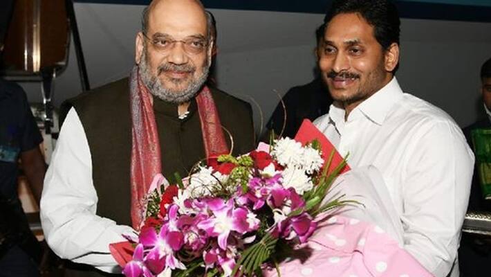 ap cm jagan welcomes amit shah at renigunta airport ap cm jagan welcomes amit shah at renigunta airport