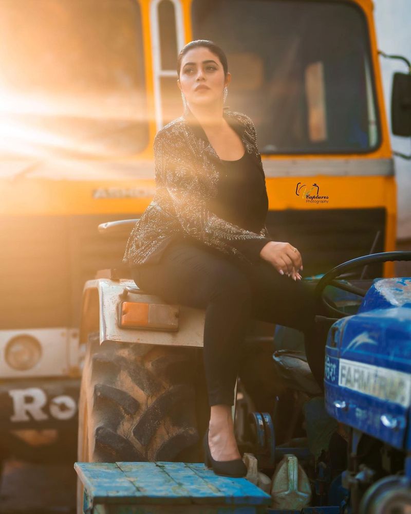 heorin poorna rises heat wears tight pants and coats