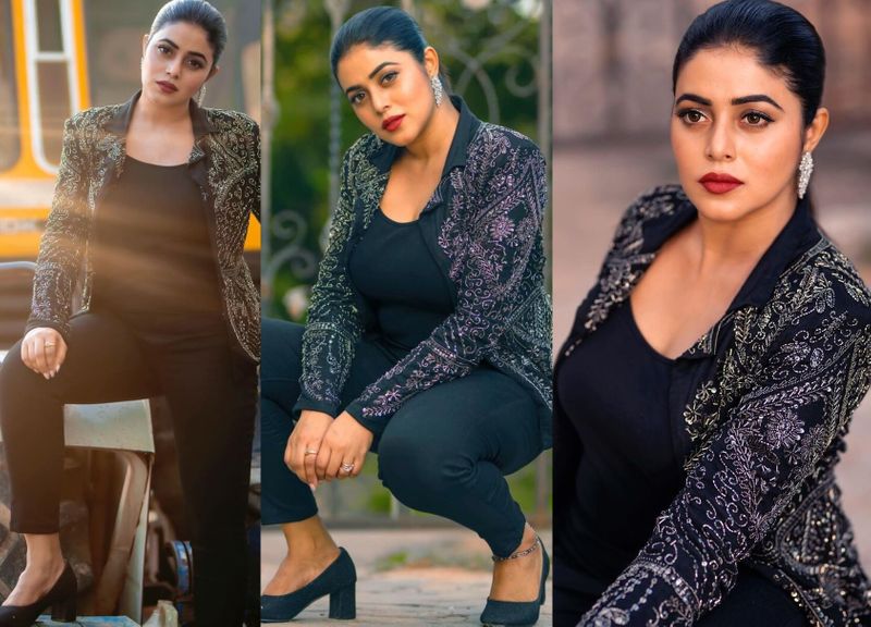 heorin poorna rises heat wears tight pants and coats