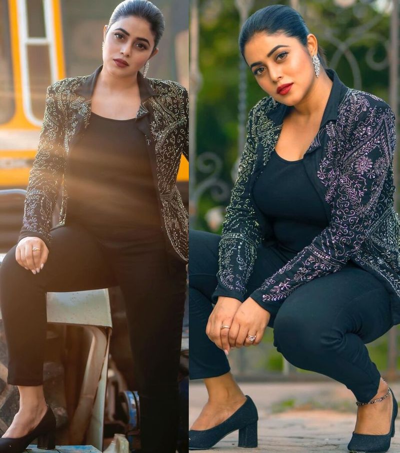 heorin poorna rises heat wears tight pants and coats
