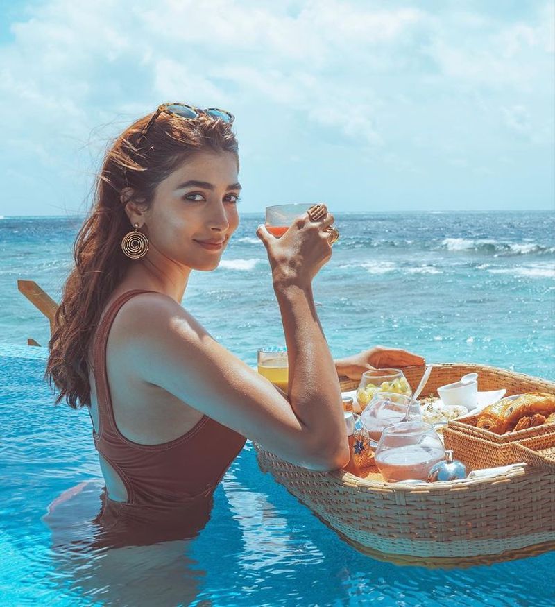 Alluring PoojaHegde Enjoying her Vacay Mode in Maldives hot photos