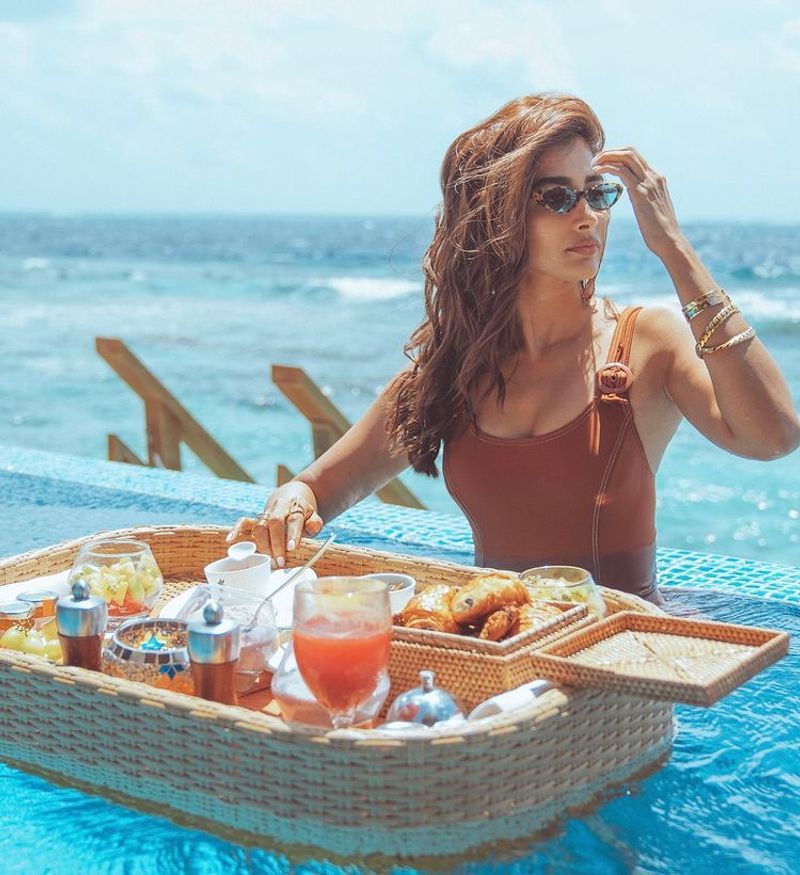 Pooja Hegde Gives Perfect Beach Vibes In White Bikini