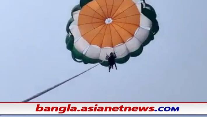 watch video couple falls into sea while they parasailing in diu bsm watch video couple falls into sea while they parasailing in diu bsm