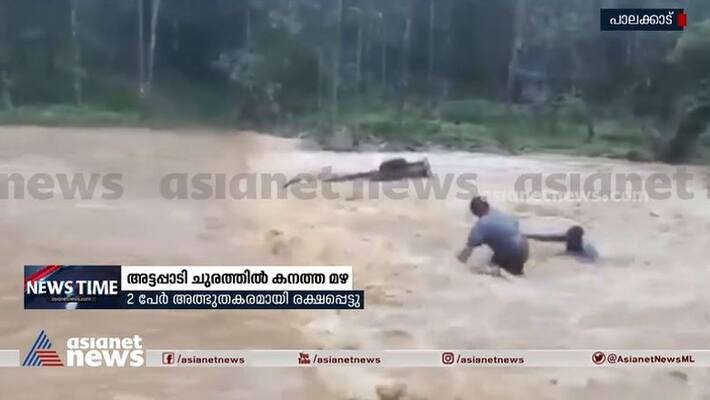 Pickup van overturns in Attappadi kerala rain The father and son miraculously escaped Pickup van overturns in Attappadi kerala rain The father and son miraculously escaped
